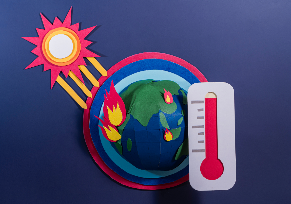 Earth foreground, flames burning, red thermometer close-up, bright sunlight, documentary style climate image, no people.